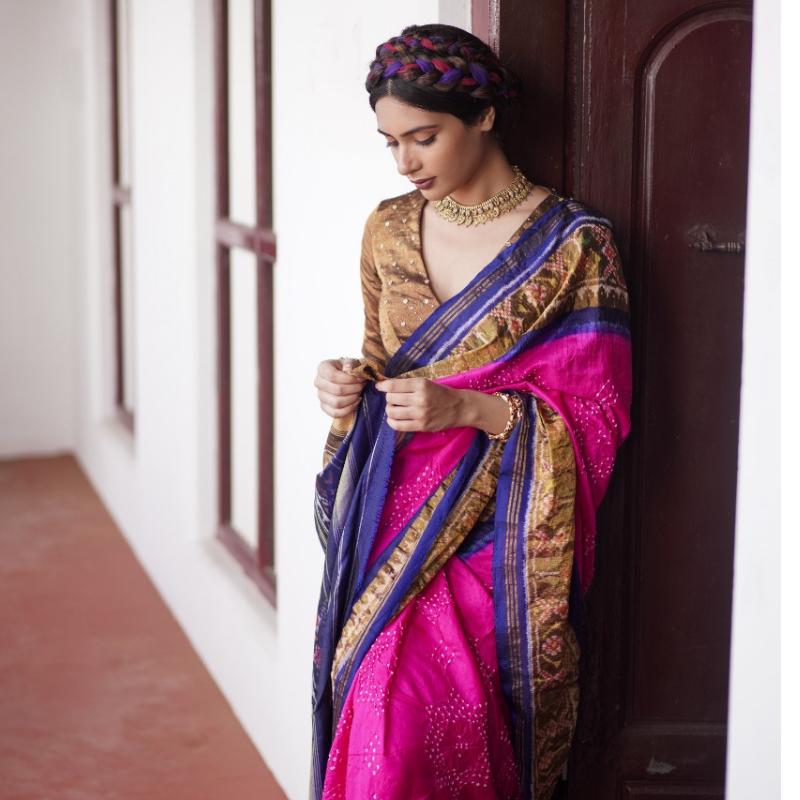 Women wearing real red bandhani saree