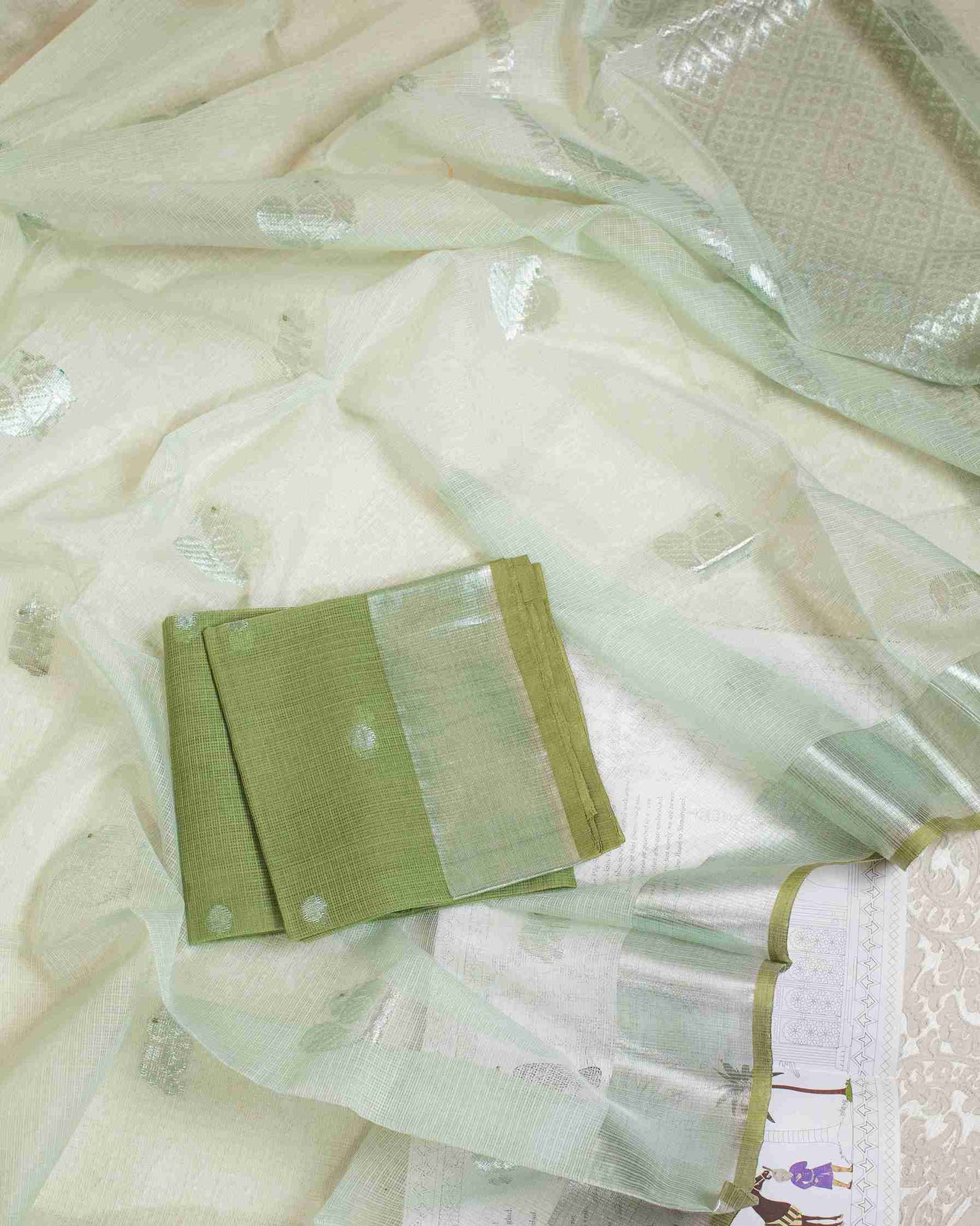 Gin Green Kota Saree with Silver Zari Buttas